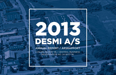 Forside af 2013 DESMI A/S årsrapport med luftfoto i baggrunden.