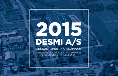 Forside af 2015 DESMI A/S Årsrapport med baggrund af et luftfoto.